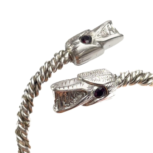 680 - James SUDDABY A contemporary .999 fine silver dragon bangle With garnet set eyes, Birmingham hallmar... 