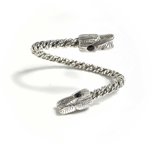 680 - James SUDDABY A contemporary .999 fine silver dragon bangle With garnet set eyes, Birmingham hallmar... 