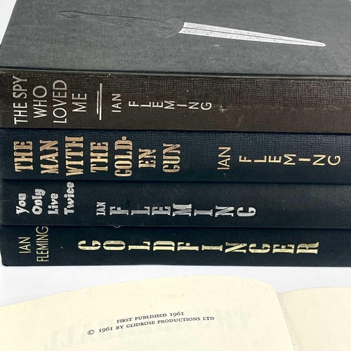 65 - Ian Fleming. Six works of which three are first editions. 'The Man with the Golden Gun,' first editi... 