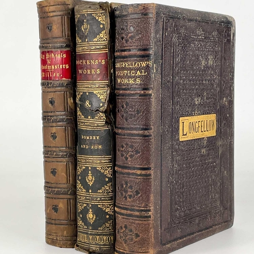 24 - Bindings. A handsome set of nine works by Charles Dickens, half black calf with marbled boards and c... 