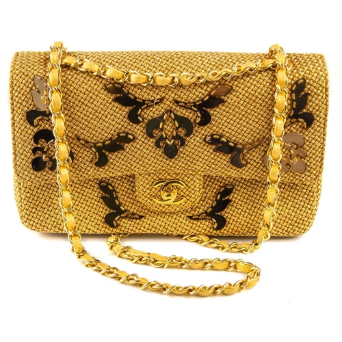 327 - A Chanel gold woven raffia 'Cruise Collection' medium classic double flap bag. Circa 2012-13, with g... 