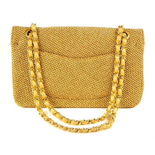 327 - A Chanel gold woven raffia 'Cruise Collection' medium classic double flap bag. Circa 2012-13, with g... 