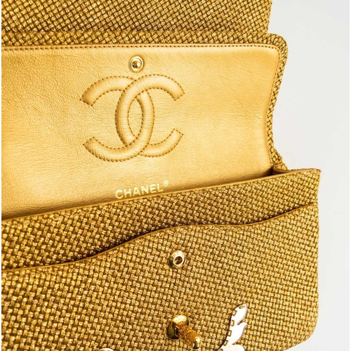 327 - A Chanel gold woven raffia 'Cruise Collection' medium classic double flap bag. Circa 2012-13, with g... 