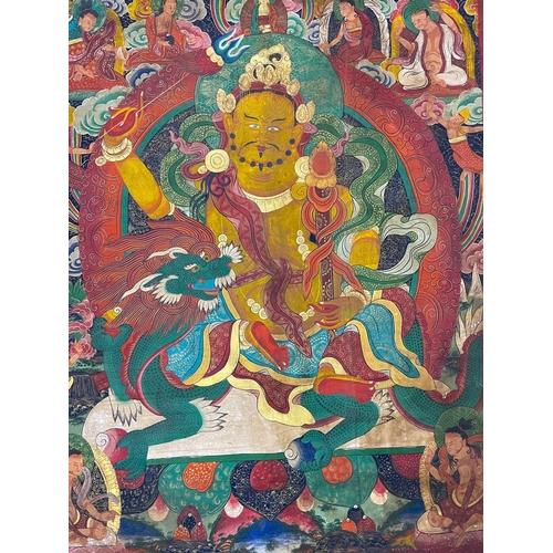 711 - A large Tibetan thangka, 19th century. Painted on canvas, 148 x 119cm.Paint is in good condition wit... 