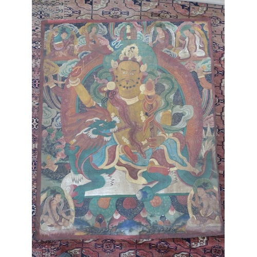 711 - A large Tibetan thangka, 19th century. Painted on canvas, 148 x 119cm.Paint is in good condition wit... 