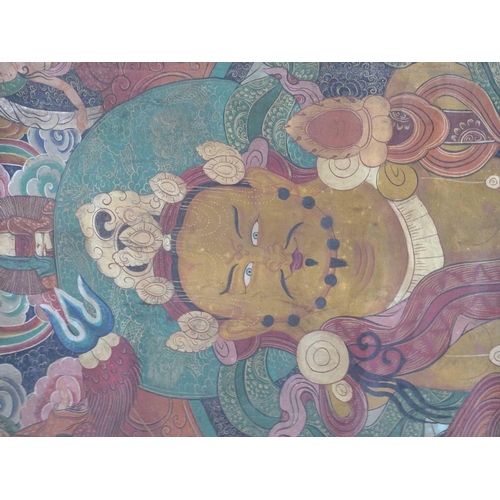 711 - A large Tibetan thangka, 19th century. Painted on canvas, 148 x 119cm.Paint is in good condition wit... 