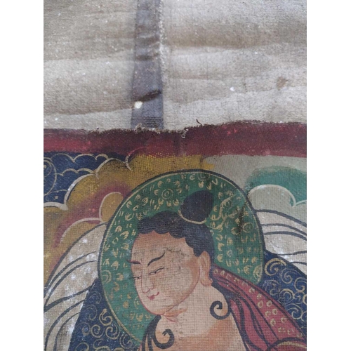711 - A large Tibetan thangka, 19th century. Painted on canvas, 148 x 119cm.Paint is in good condition wit... 