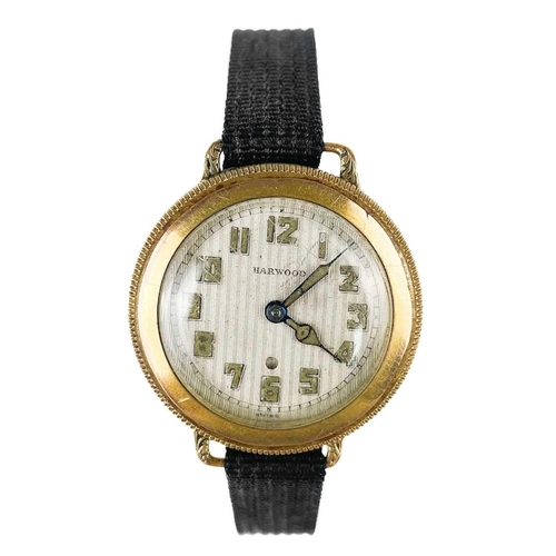 98 - A Harwood automatic 'bumper' gold filled gentleman's wristwatch. The circular textured silvered dial... 