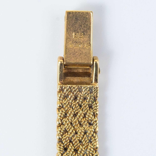 101 - A Bueche-Girod 9ct gold lady's manual wind bracelet wristwatch with diamond-set bezel. With 14mm sig... 