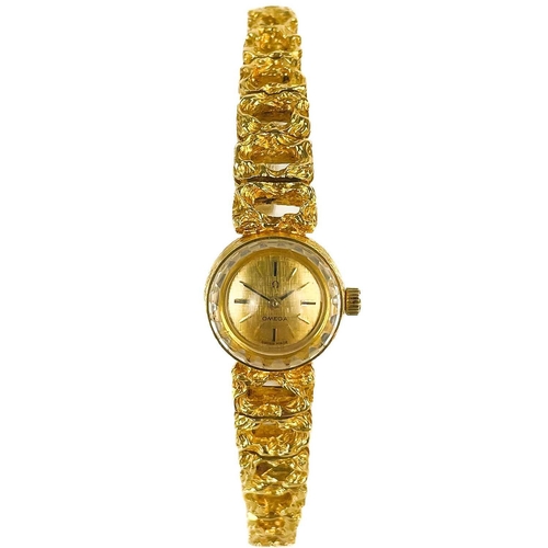 108 - An Omega 18ct gold lady's bracelet wristwatch. Cal. 650, with 14mm signed gilt dial with baton hour ... 