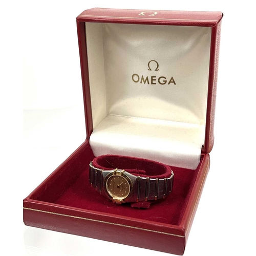 109A - An Omega Constellation lady's quartz 18ct gold and stainless steel bracelet wristwatch. Serial no. 5... 