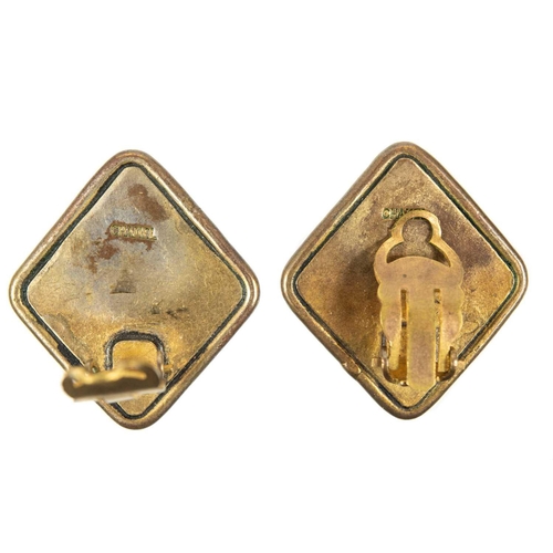 119 - A Chanel pair of 1960's brown Gripoix clip earrings. Both stamped CHANEL, width 28mm.