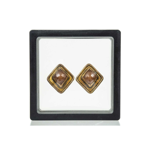 119 - A Chanel pair of 1960's brown Gripoix clip earrings. Both stamped CHANEL, width 28mm.