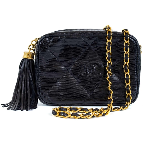 123 - A Chanel black lizard camera bag. Circa 1986-88, with gold-tone hardware, serial code sticker and au... 