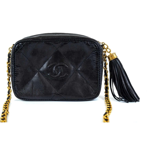 123 - A Chanel black lizard camera bag. Circa 1986-88, with gold-tone hardware, serial code sticker and au... 