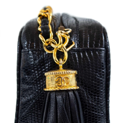 123 - A Chanel black lizard camera bag. Circa 1986-88, with gold-tone hardware, serial code sticker and au... 