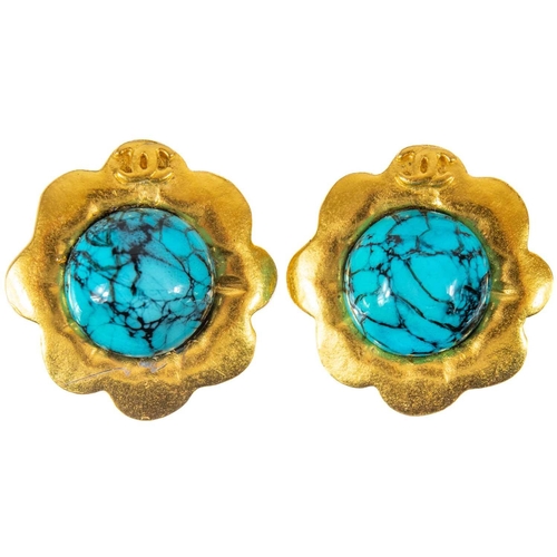 125 - A Chanel pair of turquoise set clip earrings. Circa 1996, gold tone, stamped marks and 96 P, diamete... 