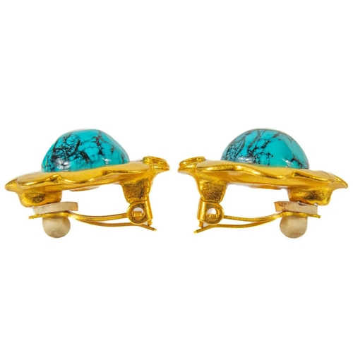 125 - A Chanel pair of turquoise set clip earrings. Circa 1996, gold tone, stamped marks and 96 P, diamete... 