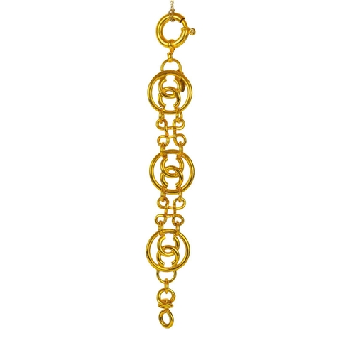 129 - A Chanel CC three medallion bracelet. Circa 1993, gold tone, stamped CHANEL MADE IN FRANCE 93 P to o... 