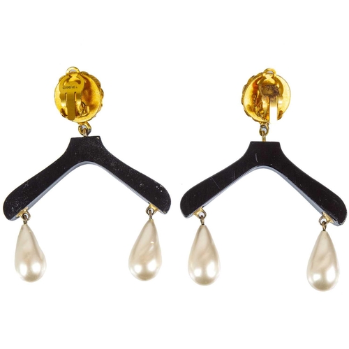 135 - A Chanel rare pair of 1980's 'coat hanger' gold-tone clip earrings. With applied faux pearl applied ... 