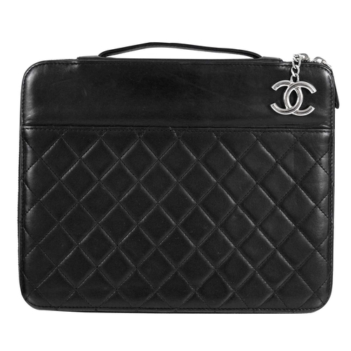 135A - A Chanel black lambskin quilted leather mini ipad case. Circa 2010-2011, silver hardware, serial sti... 