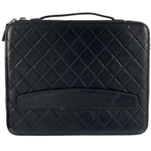 135A - A Chanel black lambskin quilted leather mini ipad case. Circa 2010-2011, silver hardware, serial sti... 