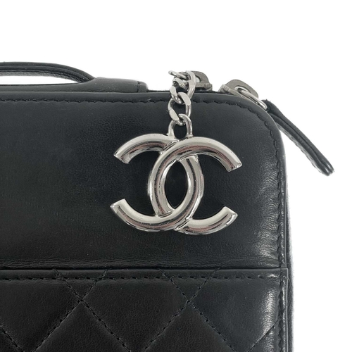 135A - A Chanel black lambskin quilted leather mini ipad case. Circa 2010-2011, silver hardware, serial sti... 