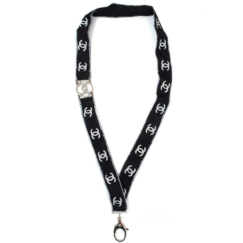 136 - A Chanel white tone metal and crystal set CC lanyard. Etched mark B17 S, length 44cm.