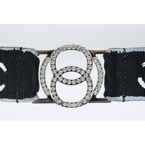 136 - A Chanel white tone metal and crystal set CC lanyard. Etched mark B17 S, length 44cm.