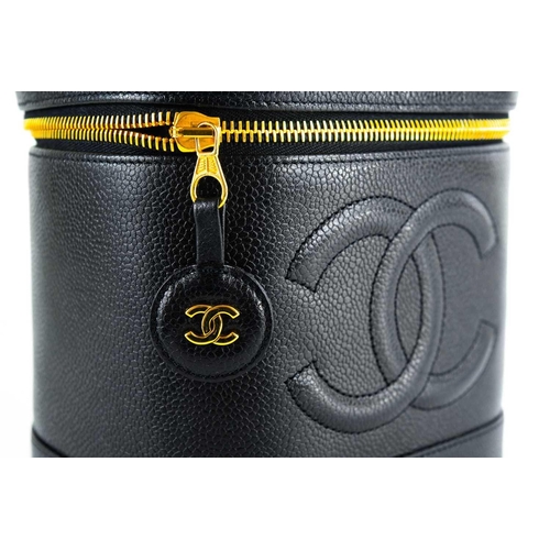 143 - A Chanel black cavier leather vanity case. Circa 1996-97, serial no. 420xxxx, autenticity card and d... 