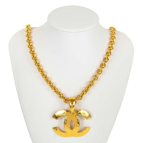 149 - A good Chanel gold tone CC quilted pendant necklace. The large pendant stamped CHANEL 94 P MADE IN F... 