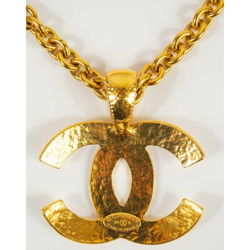 149 - A good Chanel gold tone CC quilted pendant necklace. The large pendant stamped CHANEL 94 P MADE IN F... 