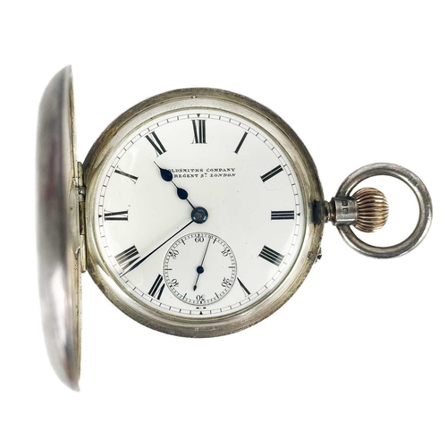 16 - An Edwardian silver half hunter crown wind pocket watch by Goldsmiths Company. The 40mm white enamel... 