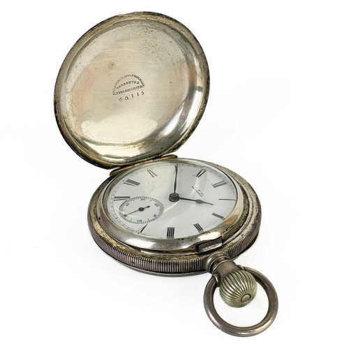 17 - A Waltham sterling silver cased large full hunter crown wind pocket watch. The signed 44mm white ena... 