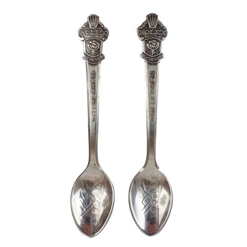 48 - A pair of silver plated Rolex Bucherer souvenir teaspoons. Length 11cm.