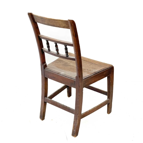 108 - A country made oak dining chair. With spindle back and solid seat, together with a pair of Windsor t... 