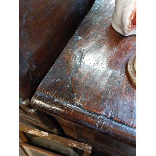 109 - An 18th century oak chest of drawers. With four long drawers raised on block feet, height 99cm width... 