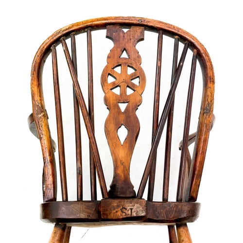 126 - A 19th century ash, elm and Fruitwood Windsor armchair. Carved S I? to the rear of the seat, height ... 