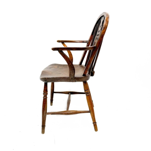 126 - A 19th century ash, elm and Fruitwood Windsor armchair. Carved S I? to the rear of the seat, height ... 