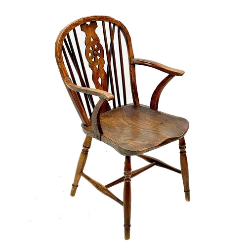 126 - A 19th century ash, elm and Fruitwood Windsor armchair. Carved S I? to the rear of the seat, height ... 