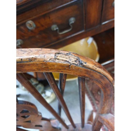 126 - A 19th century ash, elm and Fruitwood Windsor armchair. Carved S I? to the rear of the seat, height ... 