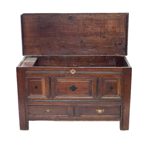 130 - An oak joined small mule chest. Early 18th century, the interior fitted a candle box, the three pane... 