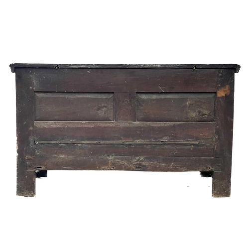 130 - An oak joined small mule chest. Early 18th century, the interior fitted a candle box, the three pane... 