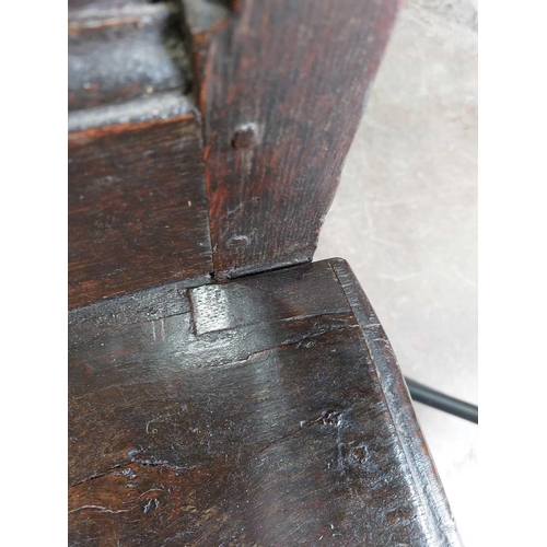 132 - A 17th century North Country bobbin Wainscot chair. With a shaped top rail, central carved lozenge a... 