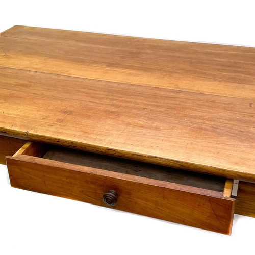 145 - A French walnut kitchen table. 19th century, fitted a single frieze drawer and raised on square tape... 