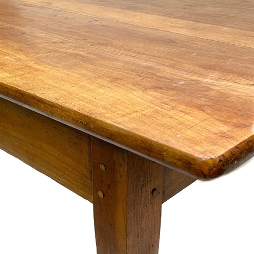 145 - A French walnut kitchen table. 19th century, fitted a single frieze drawer and raised on square tape... 