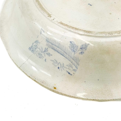 149 - A blue and white pearlware meat platter. Circa 1840, printed with butterflies and an urn of flowers,... 