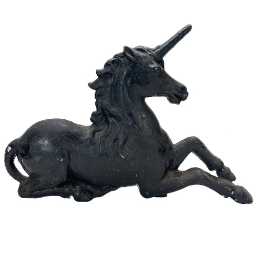 152 - A pair of Victorian painted cast iron lion and unicorn figures. Length 70 and 64cm.No structural dam... 