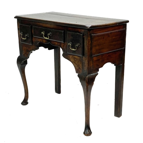 160 - A George III fruitwood low boy. Fitted three drawers, on cabriole legs, height 70cm, width 76.5cm, d... 