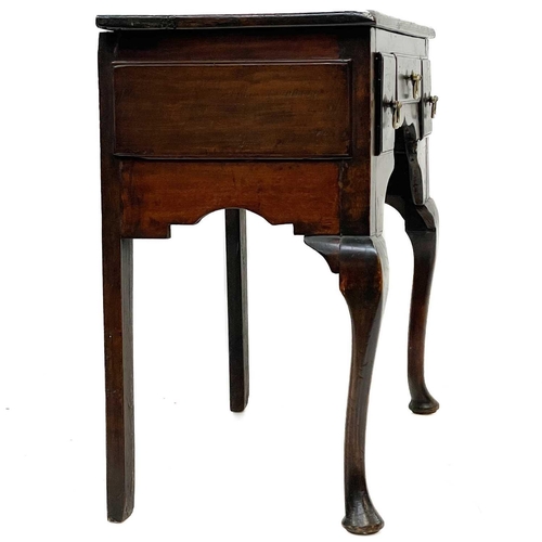 160 - A George III fruitwood low boy. Fitted three drawers, on cabriole legs, height 70cm, width 76.5cm, d... 